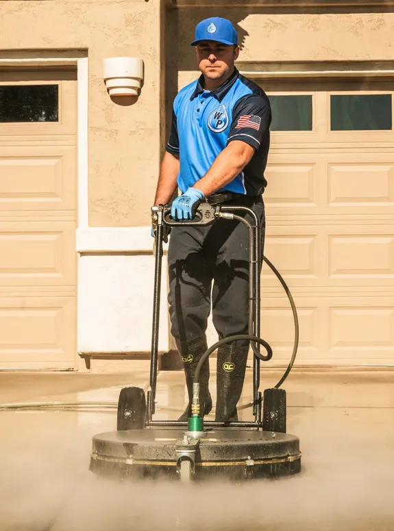 Wash Patrolman Steam Cleaning Concrete Driveway in Sun City